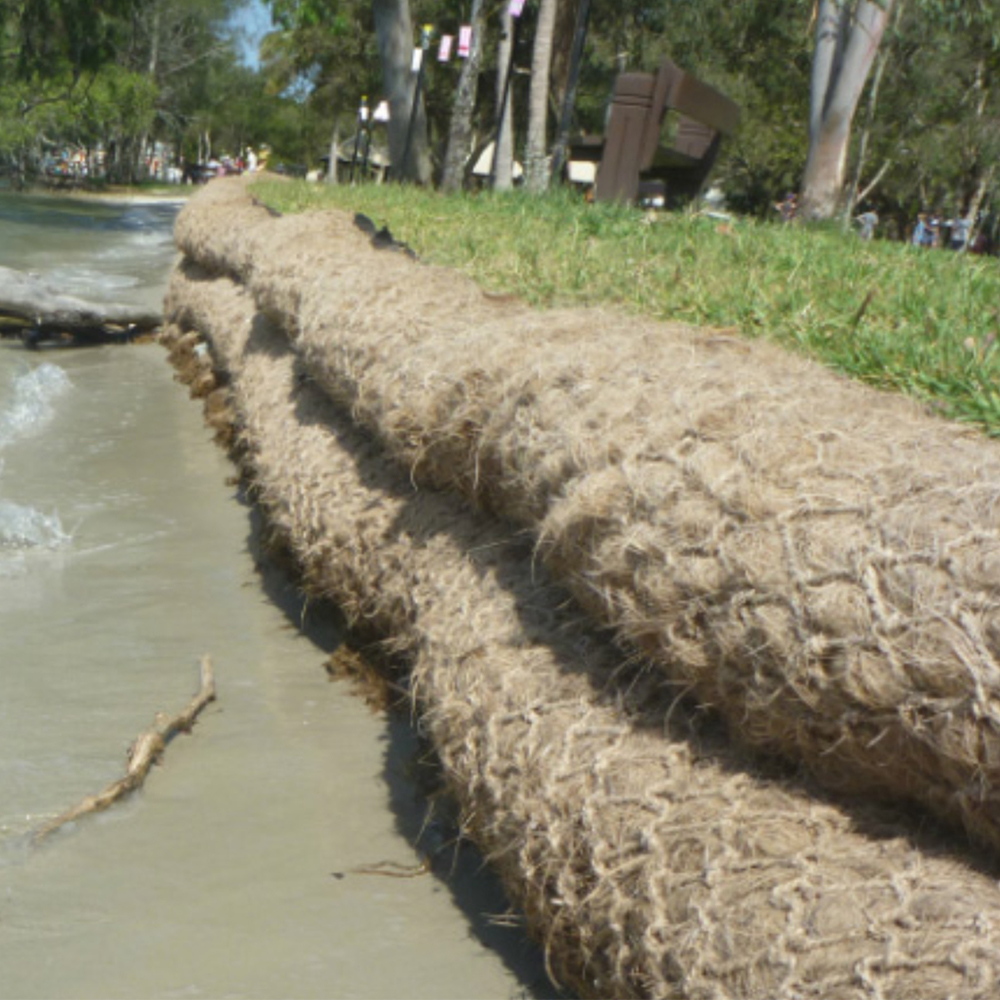 Coir logs preventing erosion on a sandbank.